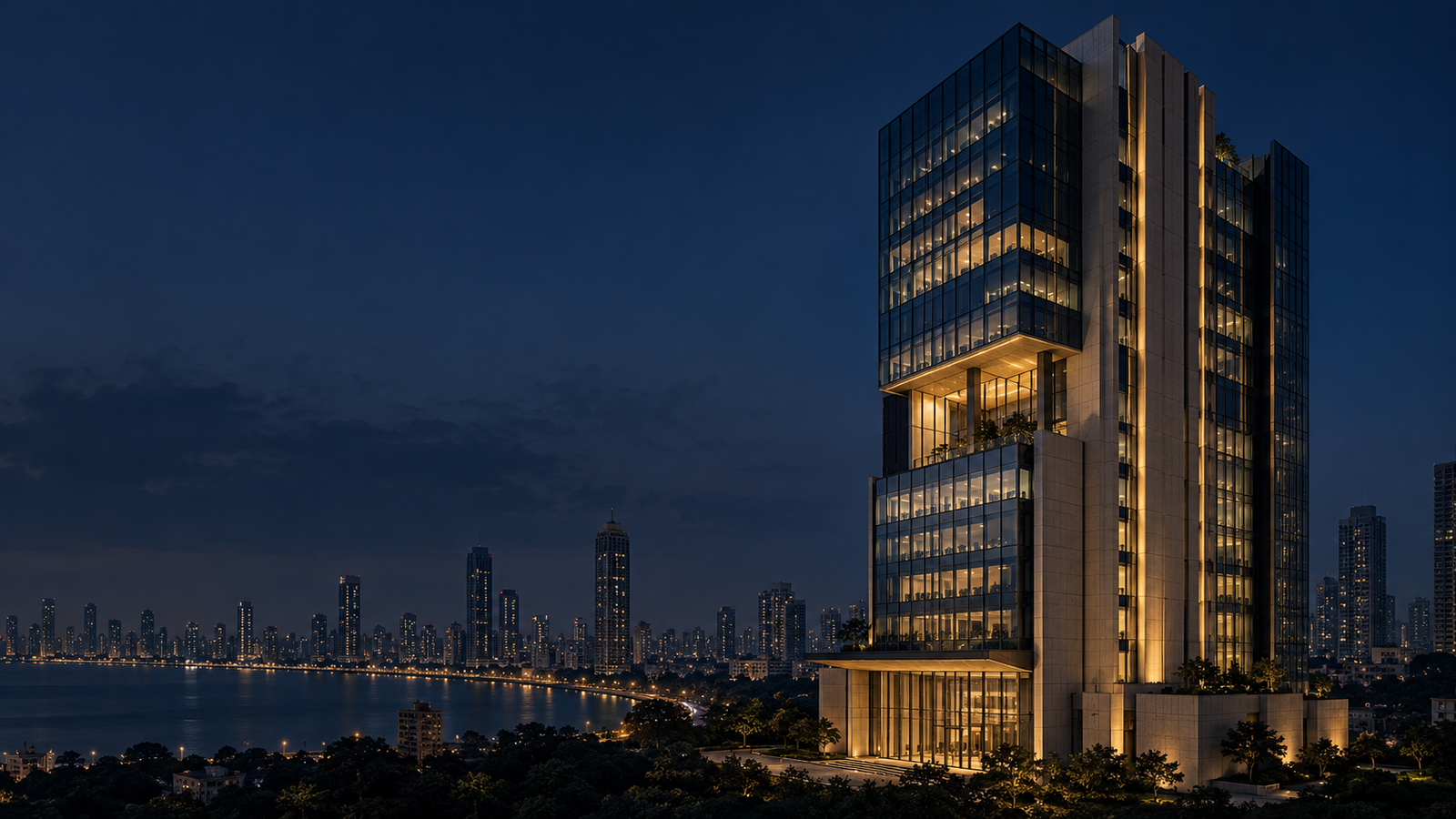 Modern financial office tower illuminated at twilight above the Mumbai skyline